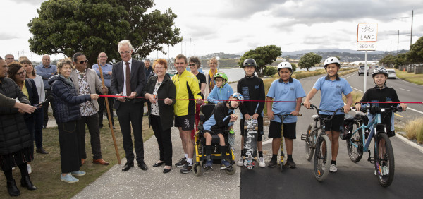 Image depicting ribbon-cutting for new paths